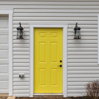 In-Law suite in Marshall, VA, Inviting and cheerful yellow door leading to the in-law suite, Additions, Golden Rule Builders
